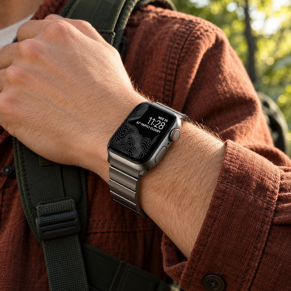 Flat-Link Titanium Band for Apple Watch, Gray, worn on the wrist outdoors